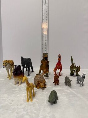 Different plastic animals figures dinosaurs and more lot of 12